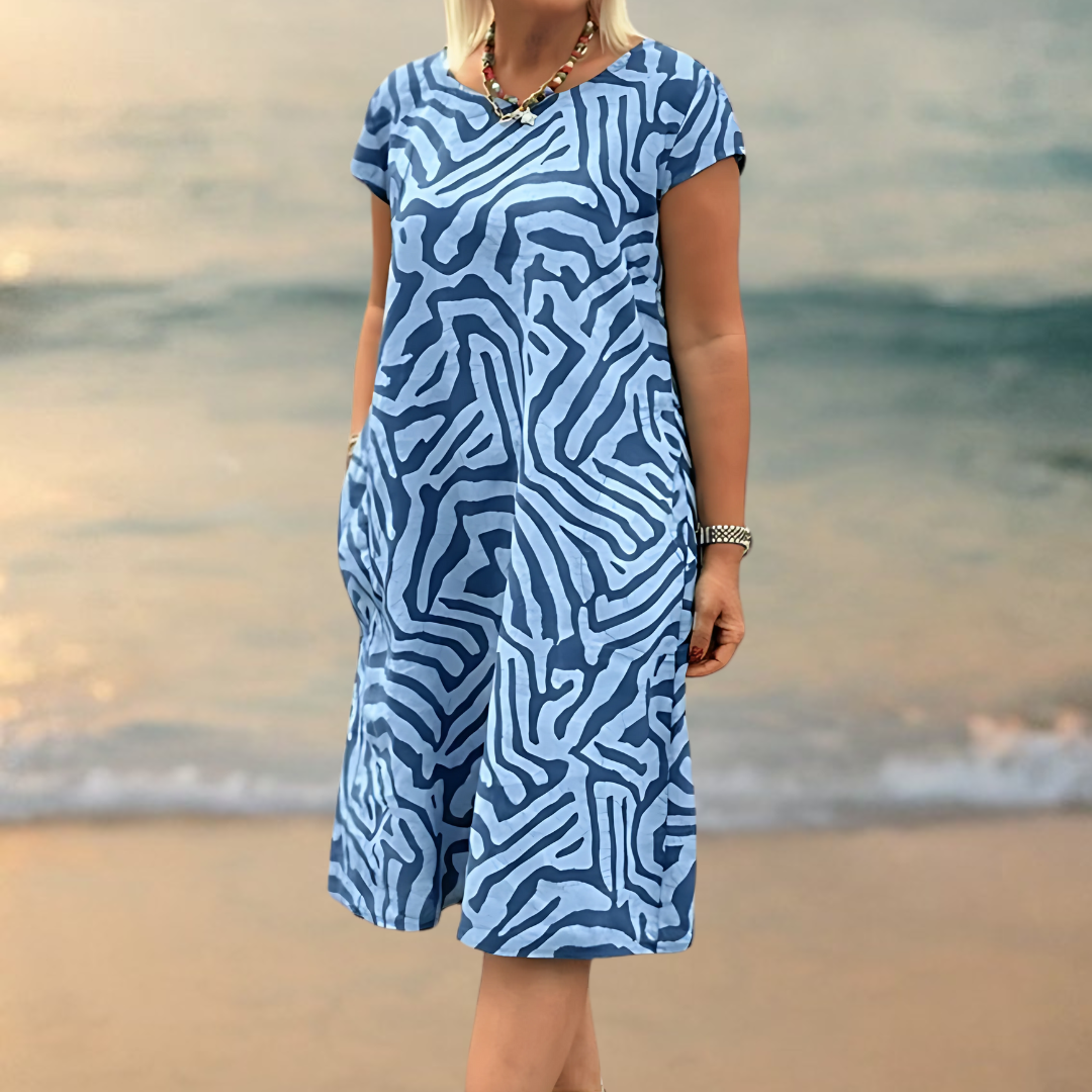 LUCILE - ROBE ÉLÉGANTE À IMPRIMÉ ZÈBRE